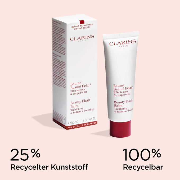 Tube von Clarins Baume Beauté Eclair mit seiner Verpackung, um die recyclingfähige Herkunft der Materialien zu veranschaulichen.