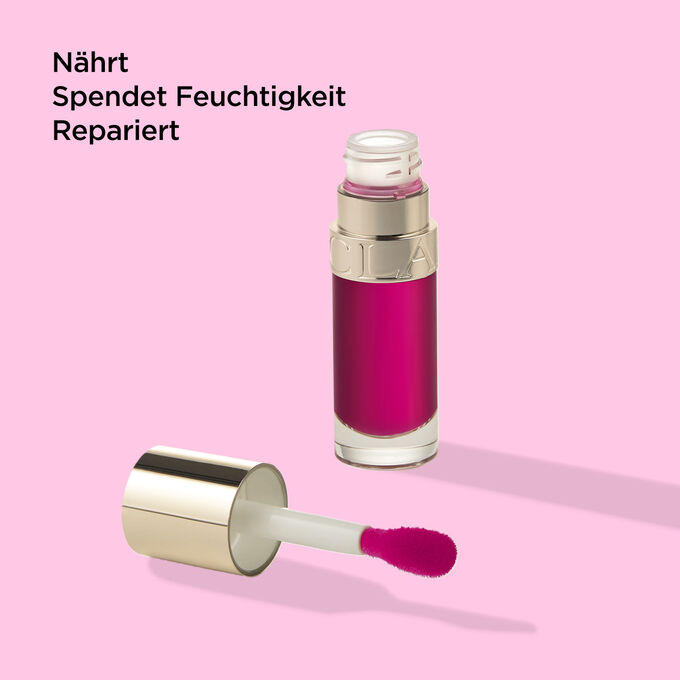 Packshot von Clarins Lip Comfort Oil 02 Raspberry mit Text, der die nährenden, feuchtigkeitsspendenden und reparierenden Eigenschaften betont.