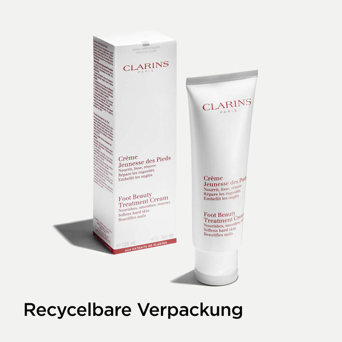 Tube der Clarins Jeunesse des Pieds Fusscreme neben seiner Verpackung, um die recyclingfähige Herkunft der Verpackung zu veranschaulichen.