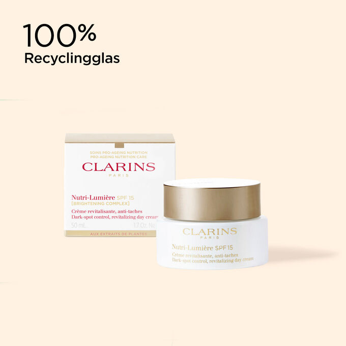 Cremedose der Anti-Aging-Creme: Nutri-Lumière LSF 15 und ihre Verpackung, um den recyclingfähigen Ursprung der Verpackung zu veranschaulichen.