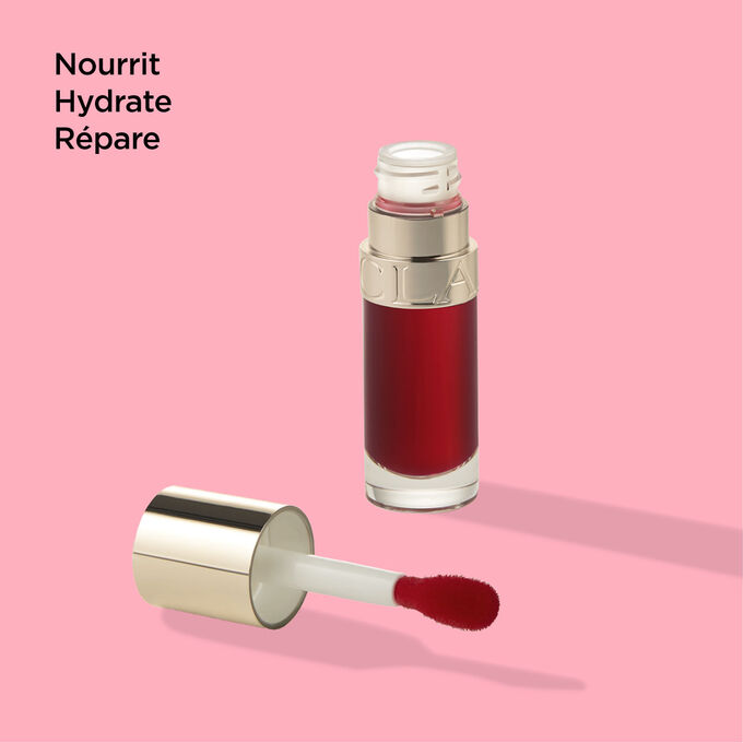 Plan produit de l'Huile Confort Lèvres 03 Cherry de Clarins et ses propriétés nourrissantes, hydratantes et réparatrices.