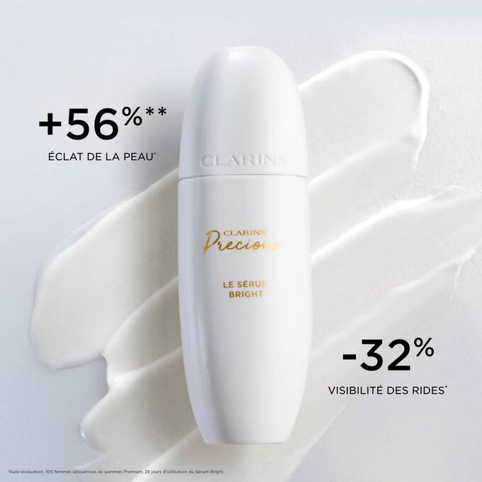 Plan produit du S&eacute;rum Bright Clarins Precious sur un fond textur&eacute;, illustrant son effet sur l'&eacute;clat de la peau et la r&eacute;duction des rides.