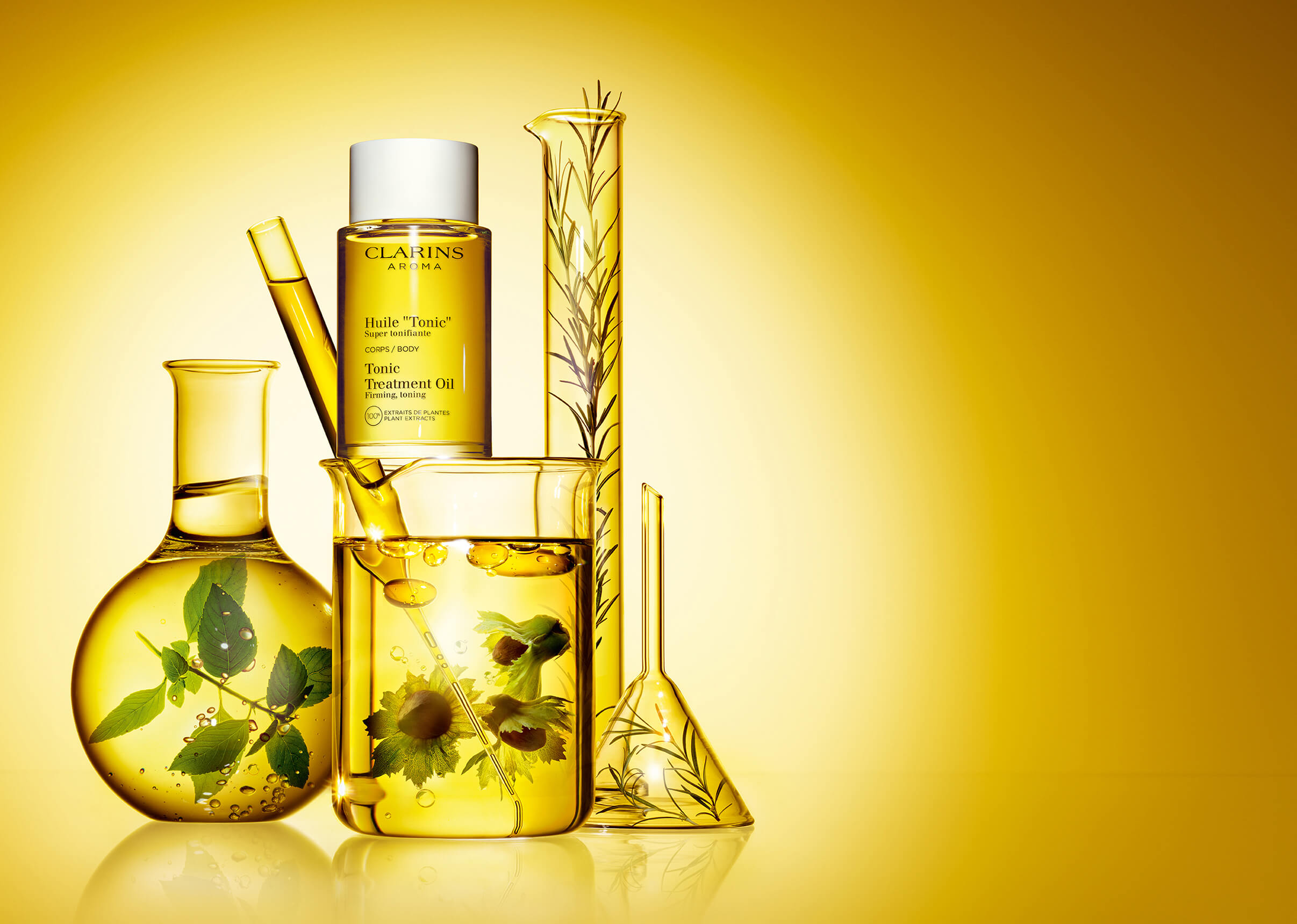 Körperöl Huile Tonic Packshot mit Laborgläsern